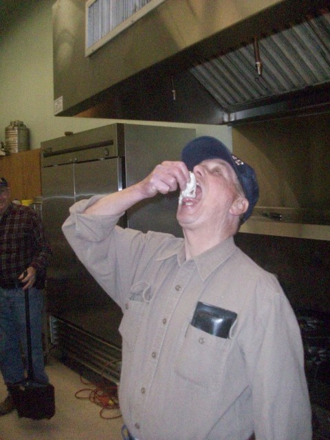 Harry Irrgang enjoying a raw oyster.